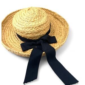 Helen Kaminski Classic 5 Raffia Straw Sun Hat with a black ribbon bow Womens